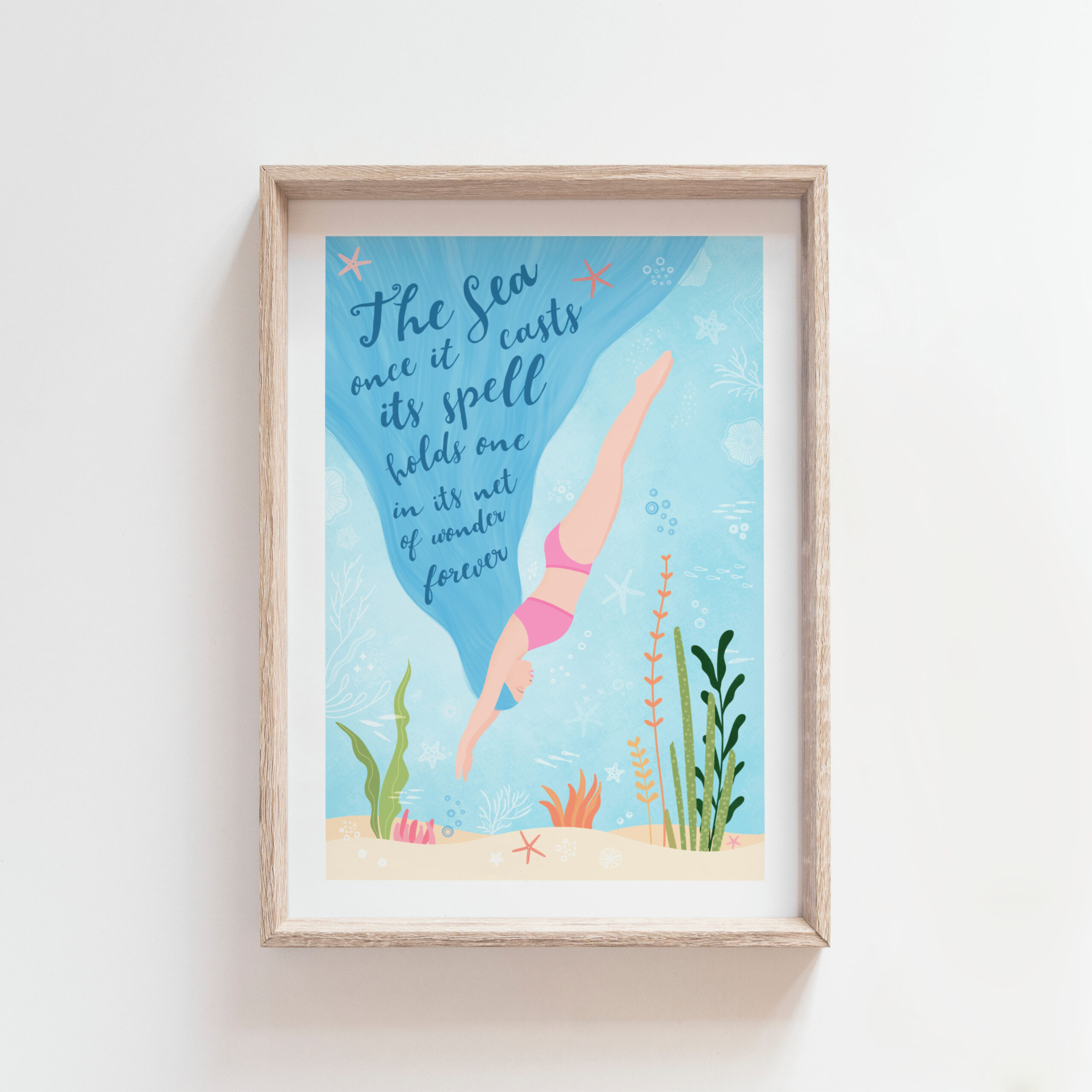 Beneath the Sea - a colourful art print of a woman divinginto the sea with the words of Jacques Cousteau entwined in her hair "The Sea once it casts its spell holds one in its net of wonder forever". Made in Co. Tipperary, Ireland by Fleur & Mimi